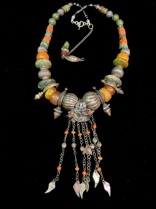 Antique earring from the Miao people repurposed as a pendant