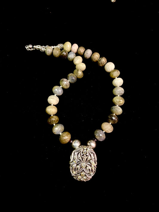 Mixed faceted agates with silver and cubic zirconia pendant