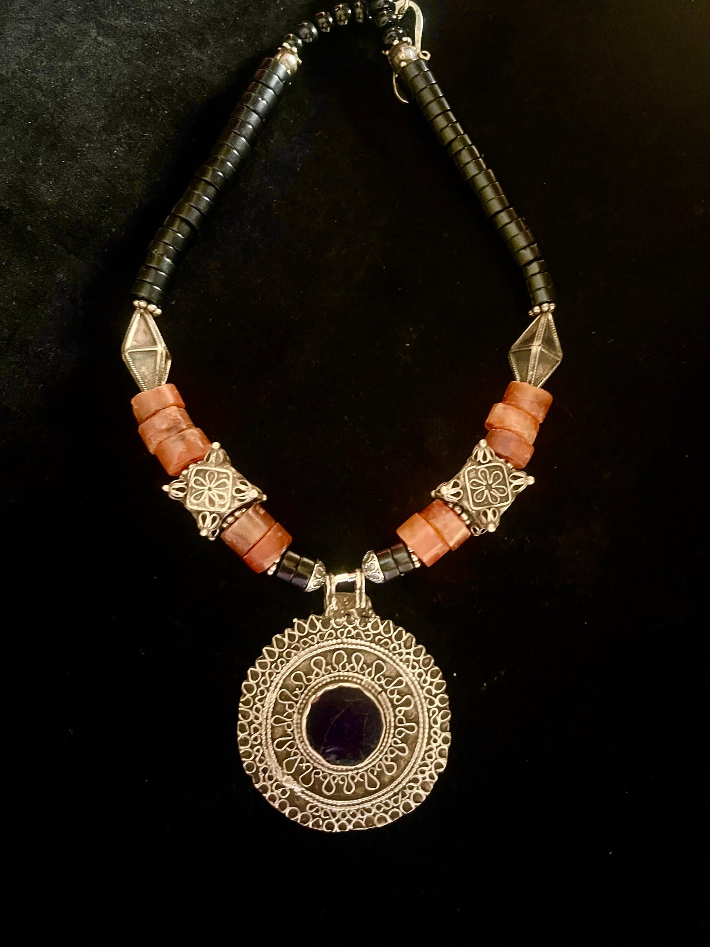 Antique silver pendant with onyx inset