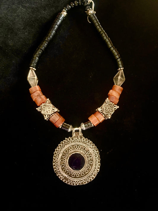 Antique silver pendant with onyx inset