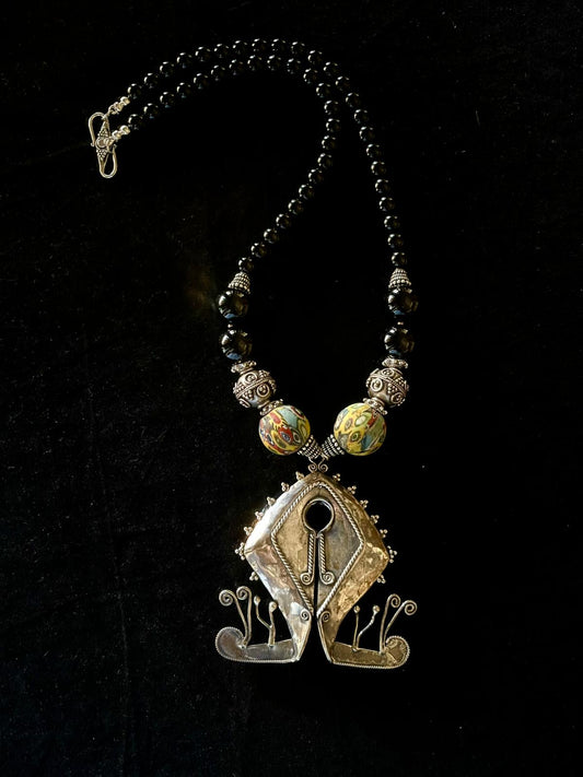 Silver Mamuli Pendant from Sumba, Indonesia