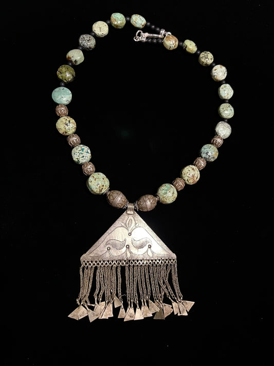 Kazakh silver pendant with turquoise