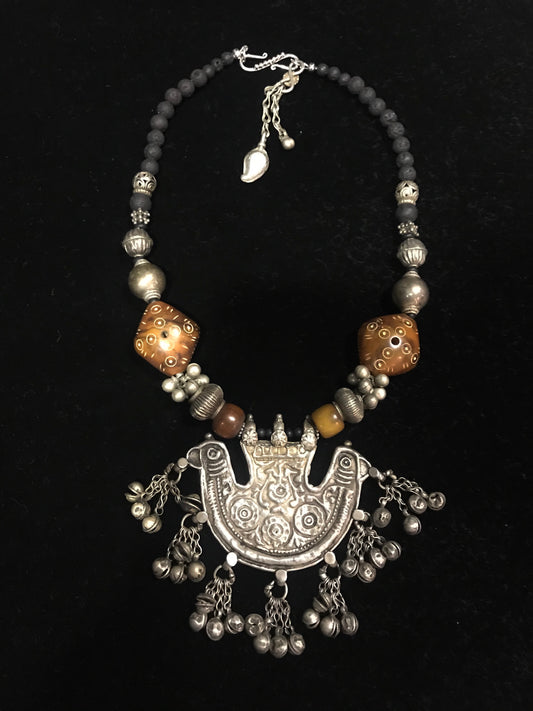 Antique silver pendant from India, with old carved phenolic beads from Mali, and old silver beads