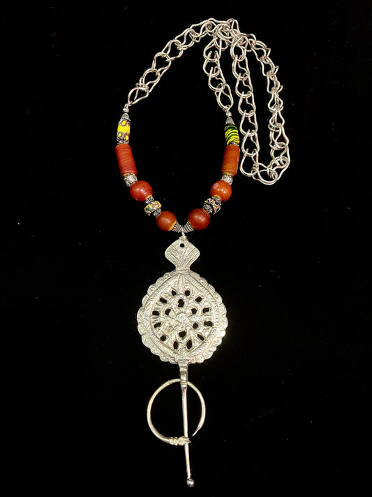 Antique silver Fibula from East Algeria, strung with antique Cornelian glass Venetian beads and Millefiori beads.