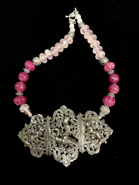 Antique silver buckle from Thailand, strung with carved pink agate beads, silver beads and rose quartz