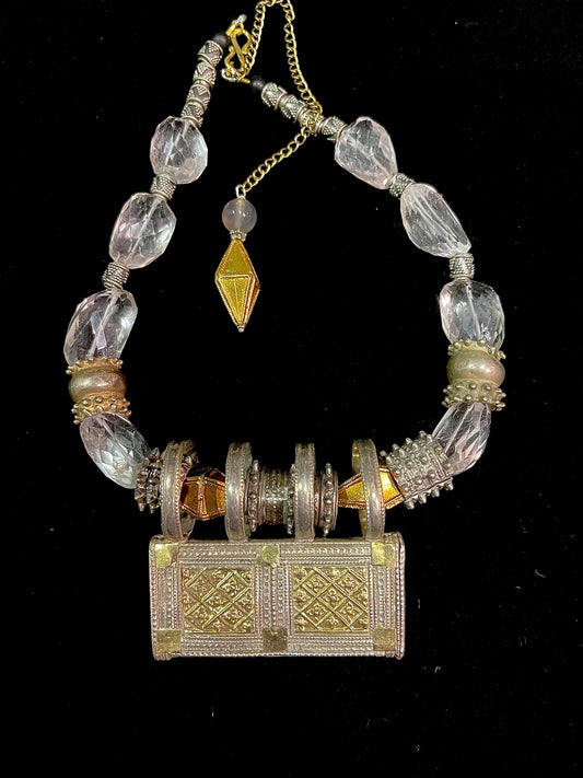 Antique silver and gold plated Omani pendant, strung with crystal quartz beads and antique Omani silver beads