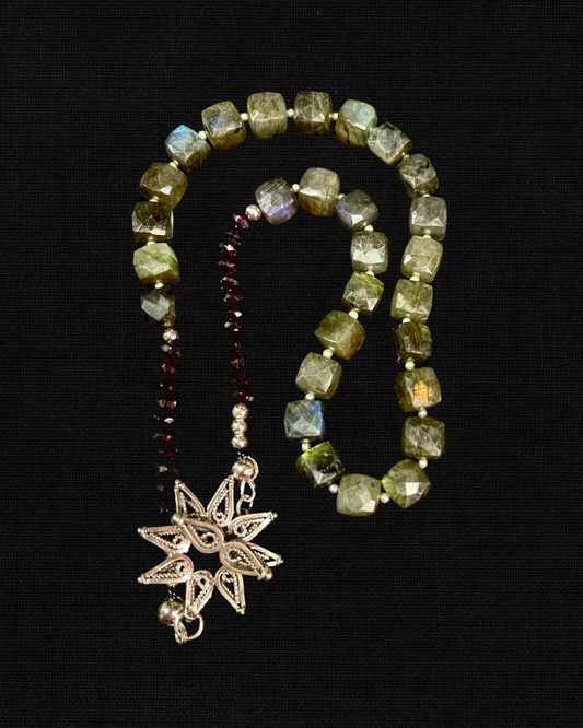 Labradorite and garnets with silver flower clasp