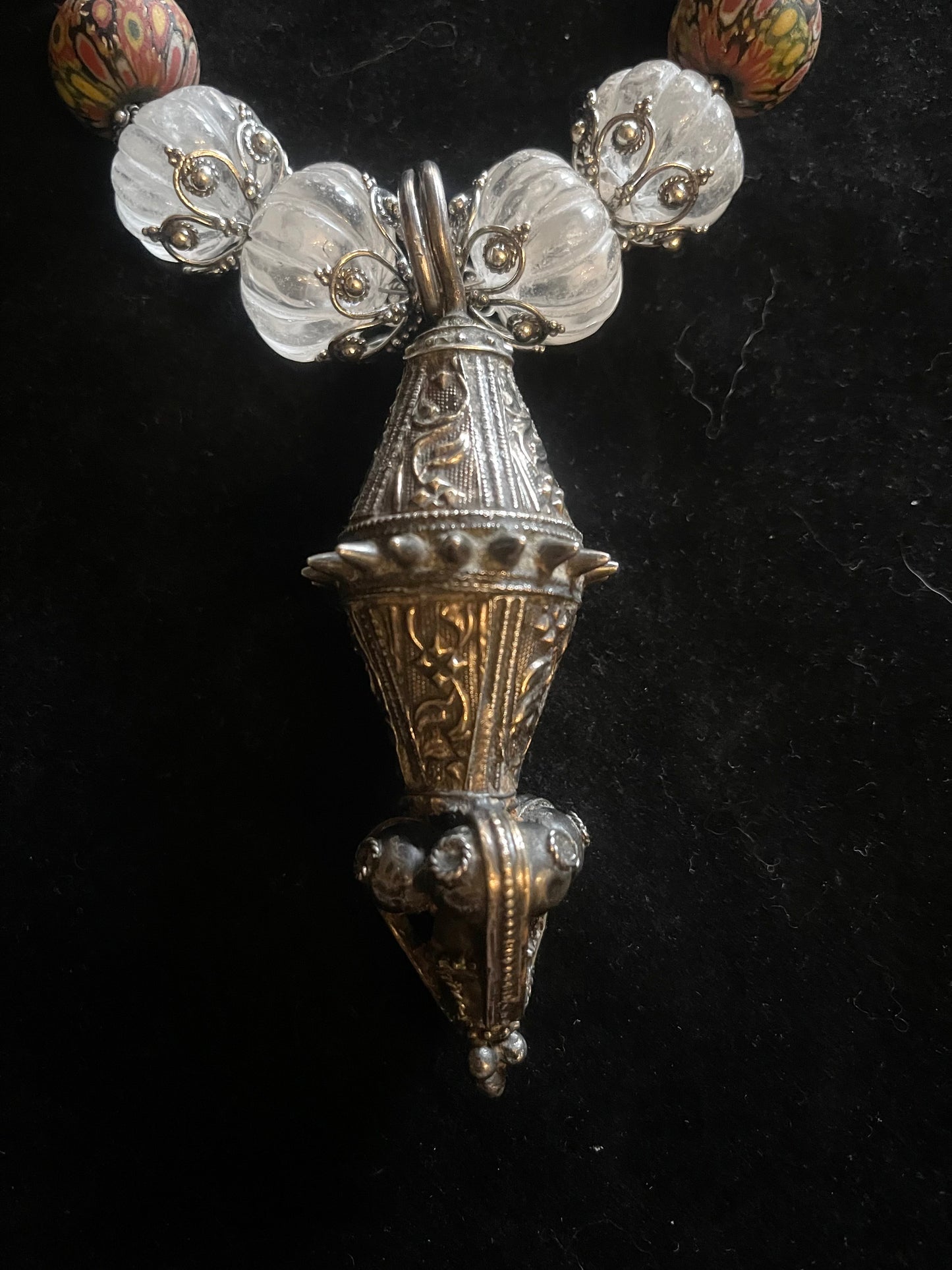 Vintage Omani silver and gold washed earring.