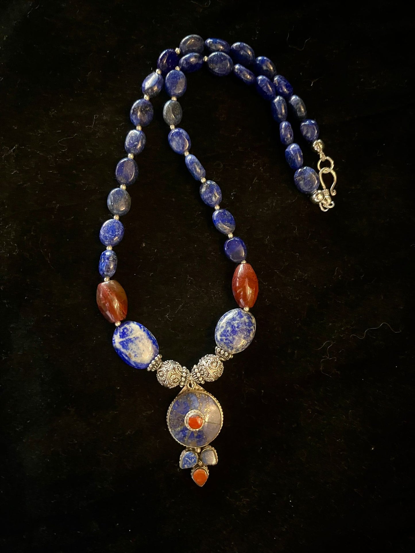 Tibetan silver pendant with lapis lazuli and coral insets