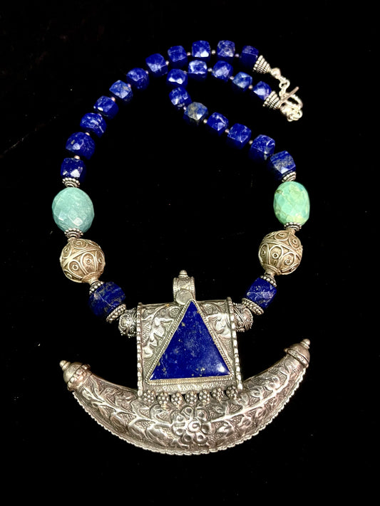 High silver pendant from Rajasthan India with an inset of Lapis Lazuli.