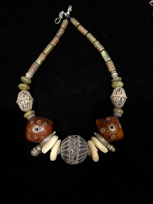 Old Mali clay beads and phenolic amber
