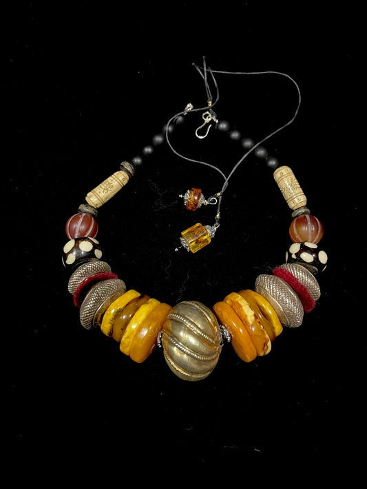 Antique Tilhari bead and Baltic amber