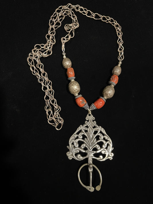 Antique silver fibula and coral