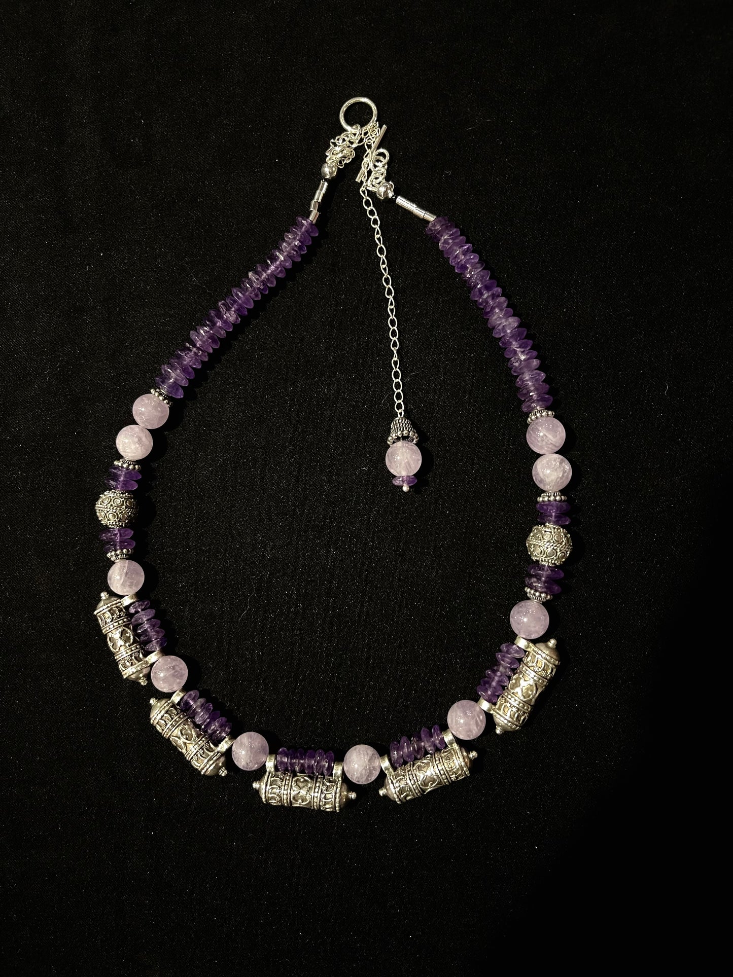 Silver Sri Lankan amulets and amethyst