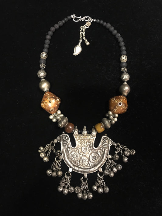Antique silver pendant from India, with old carved phenolic beads from Mali, and old silver beads 